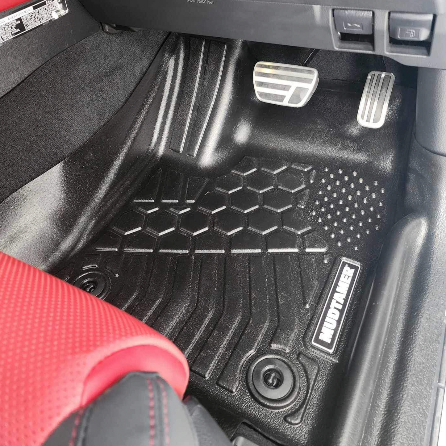 Front driver's MUDTAMER floor mat installed in a vehicle