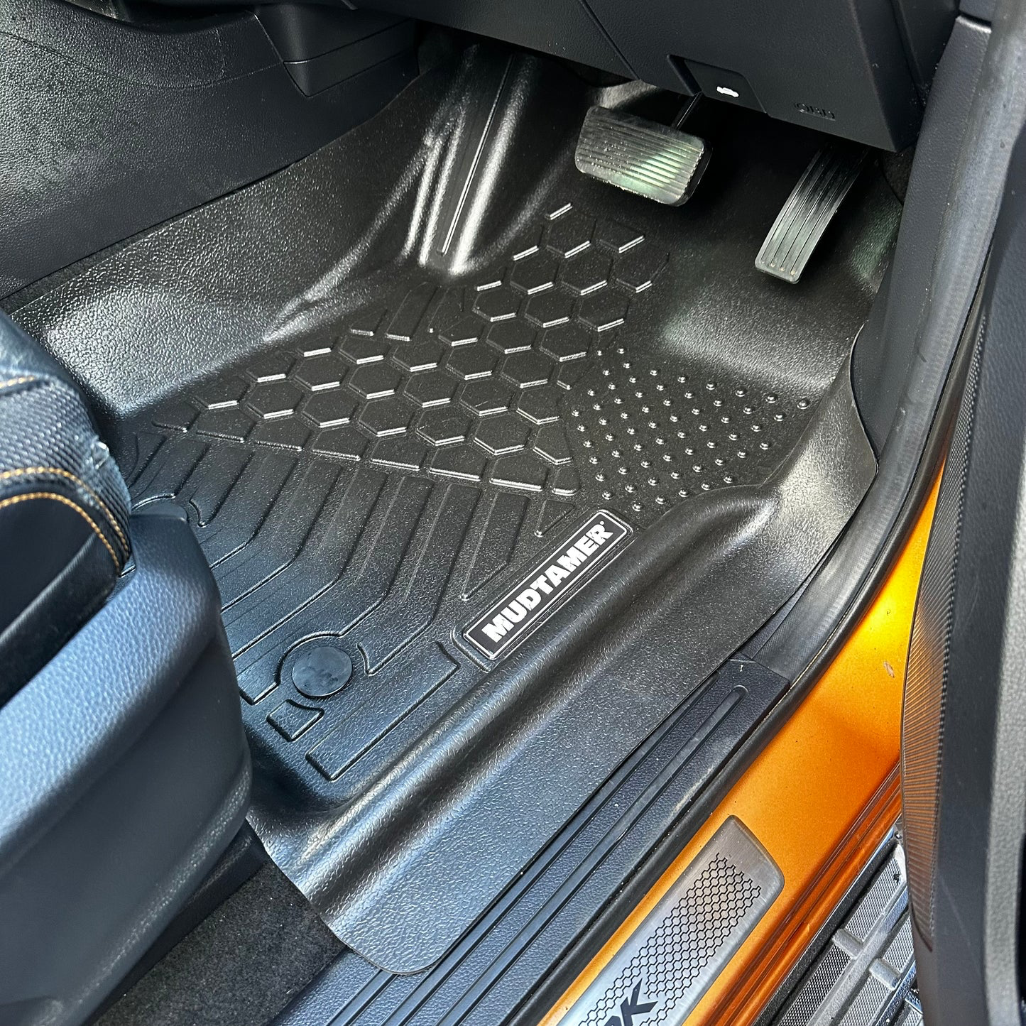 MUDTAMER driver's side floor mat installed in a PX Ranger