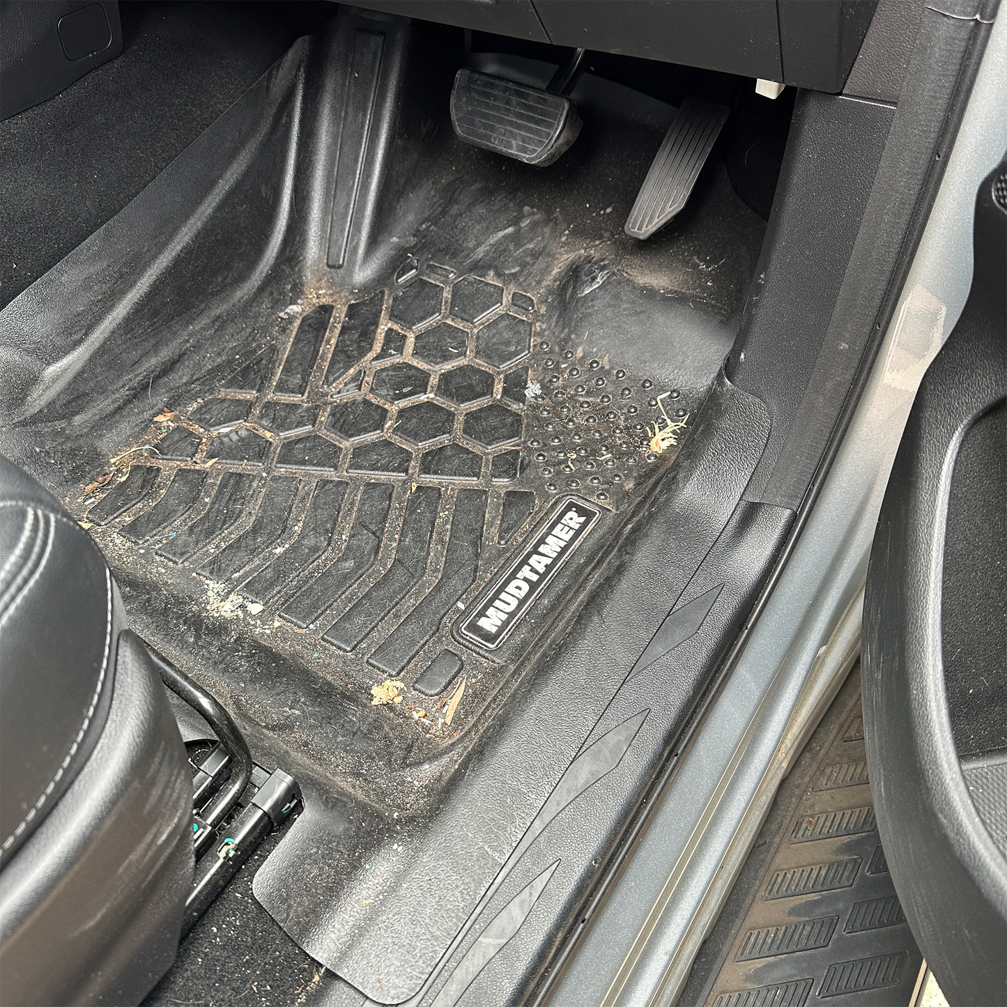 Front driver's side MUDTAMER floor mat installed in a GWM Cannon