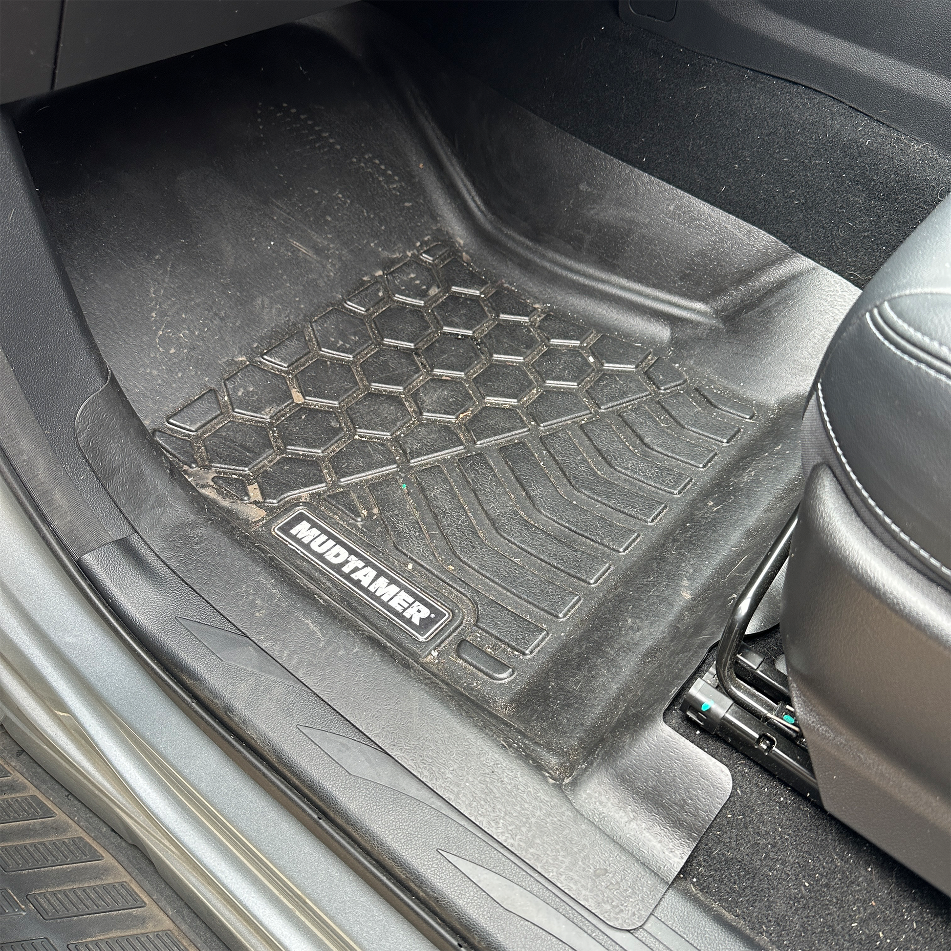 Front passenger MUDTAMER floor mat installed in a GWM Cannon