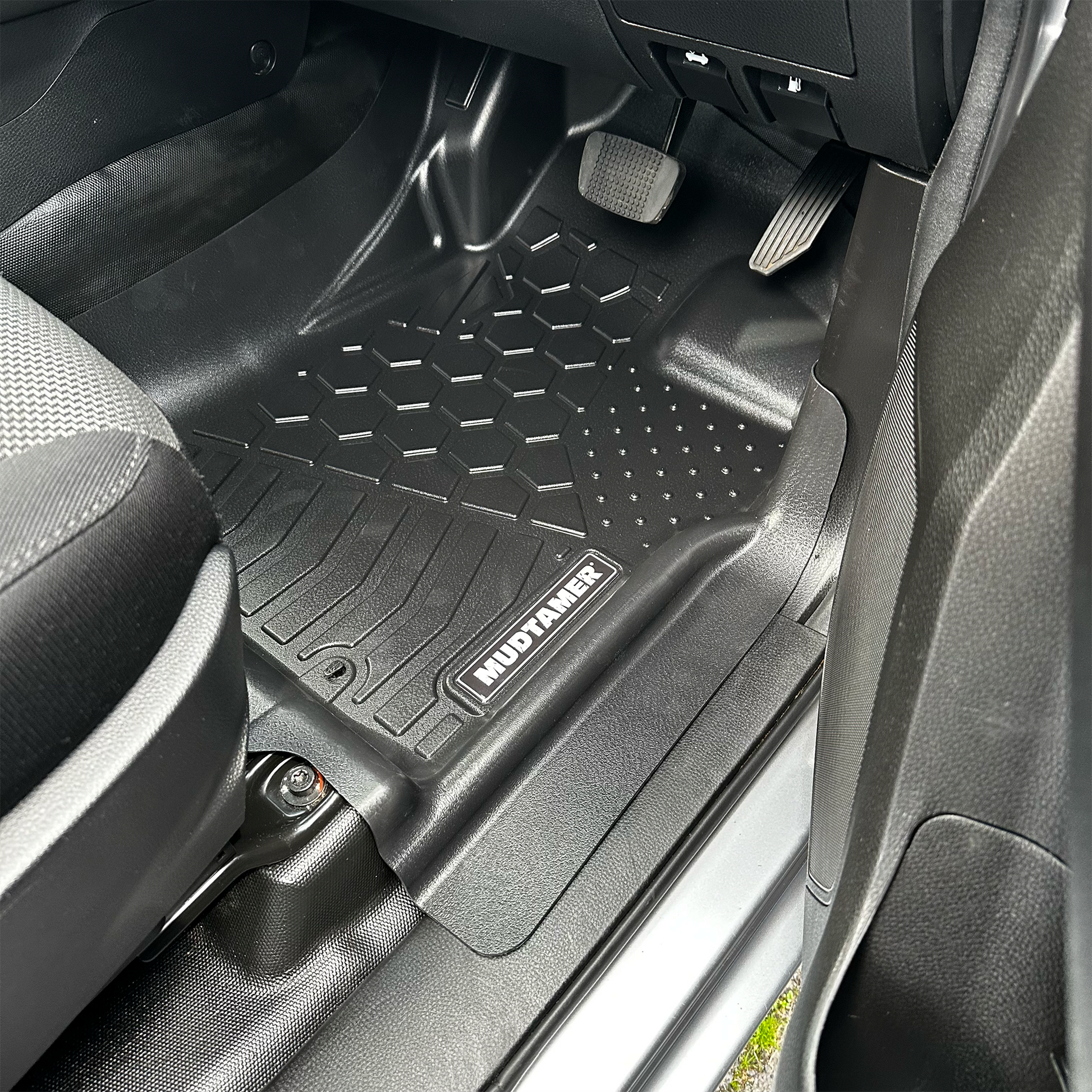 Front driver's MUDTAMER floor mat installed in vehicle