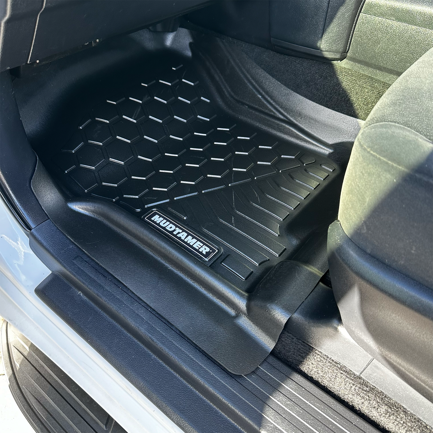 Front passenger side MUDTAMER floor mat installed in a Toyota Prado 150